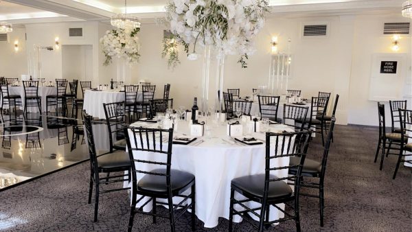 wedding reception with black tiffany chairs