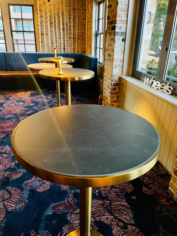 black marble brass cocktail table